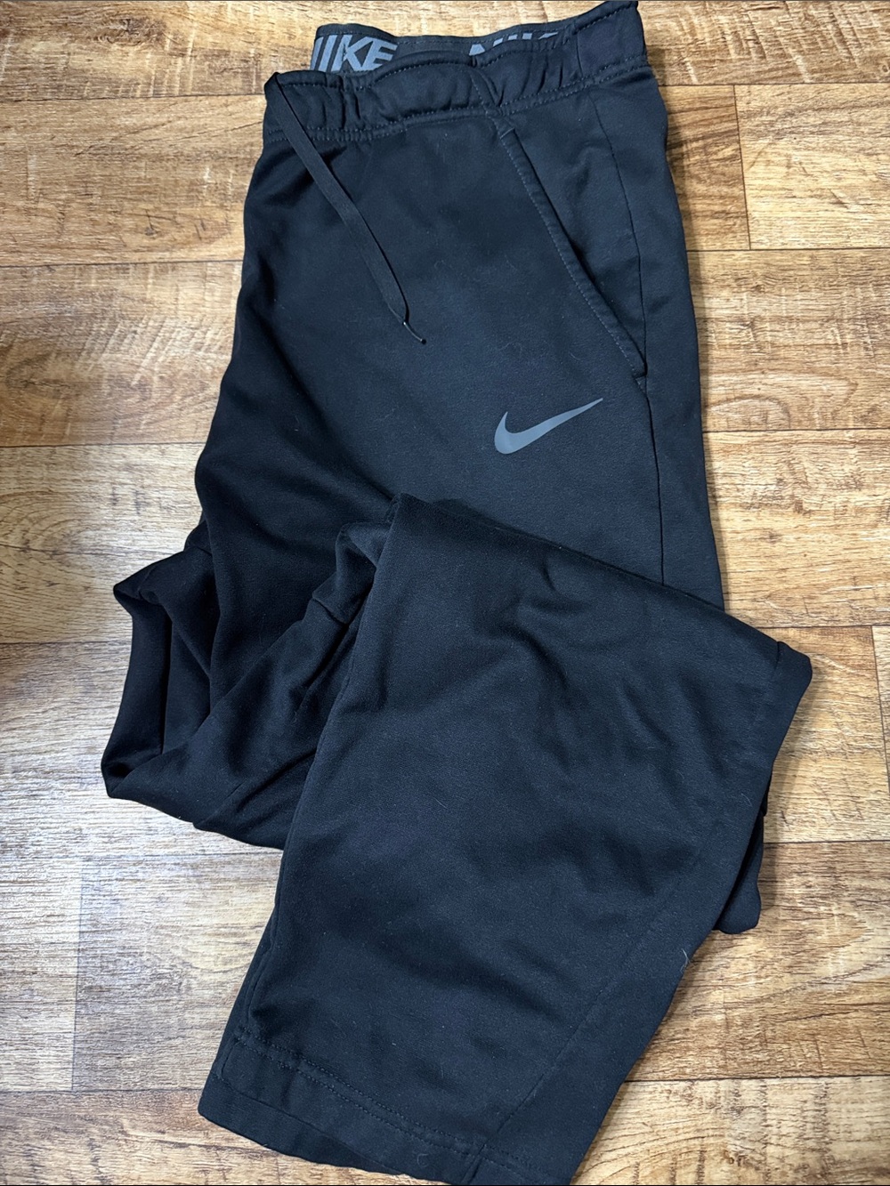 Nike Black Athletic Track Pants with Gray Swoosh